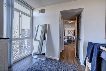 Floor to ceiling windows with tons of natural light